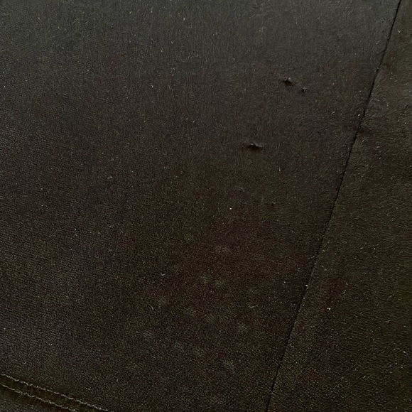 Elegant LBD w/crossover neckline & faux wrap skirt w/gold stud detail. - Picture 14 of 14